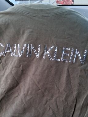 Calvin Klein Olive Green Tee with Rhinestone Logo.